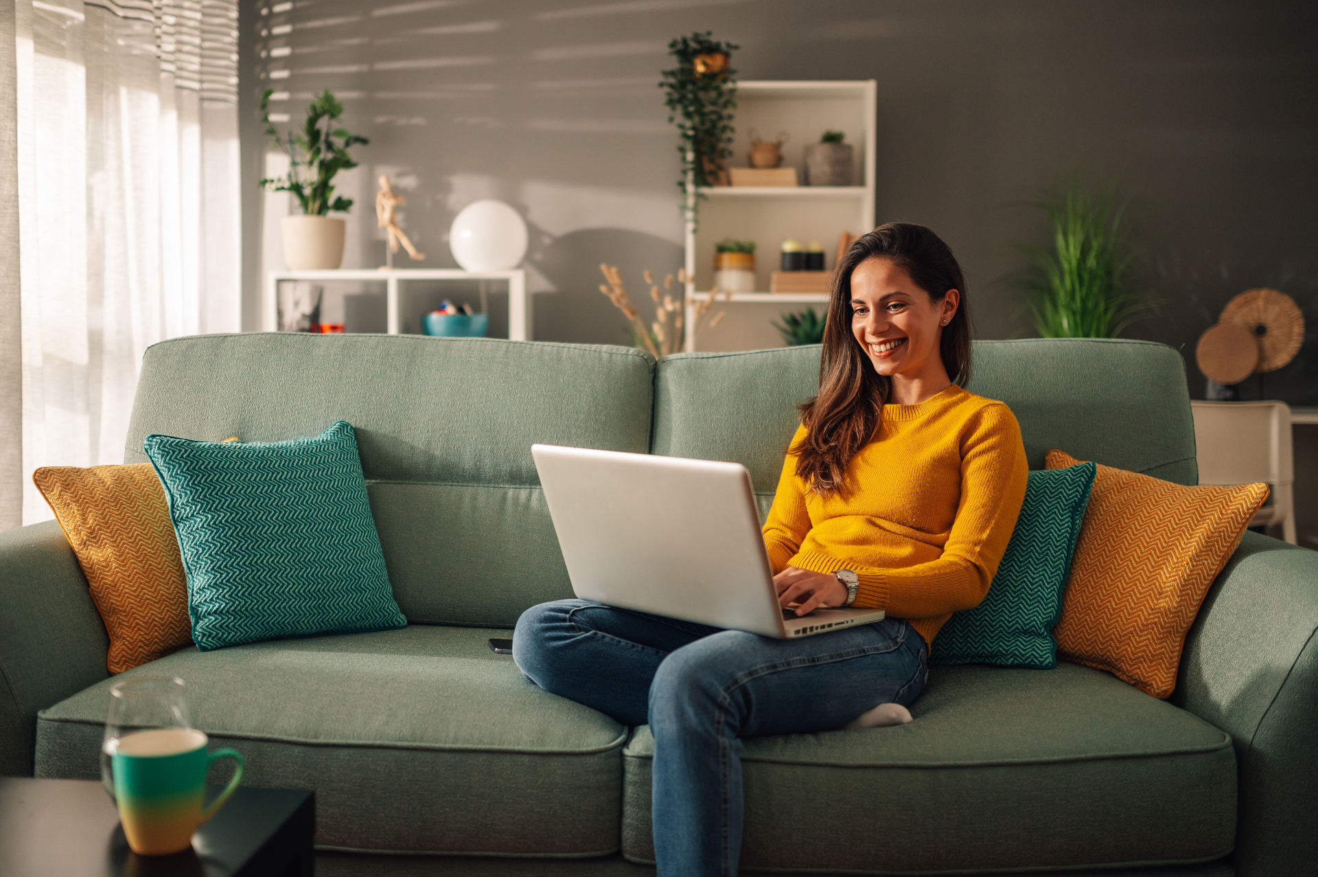 Learner studying on couch