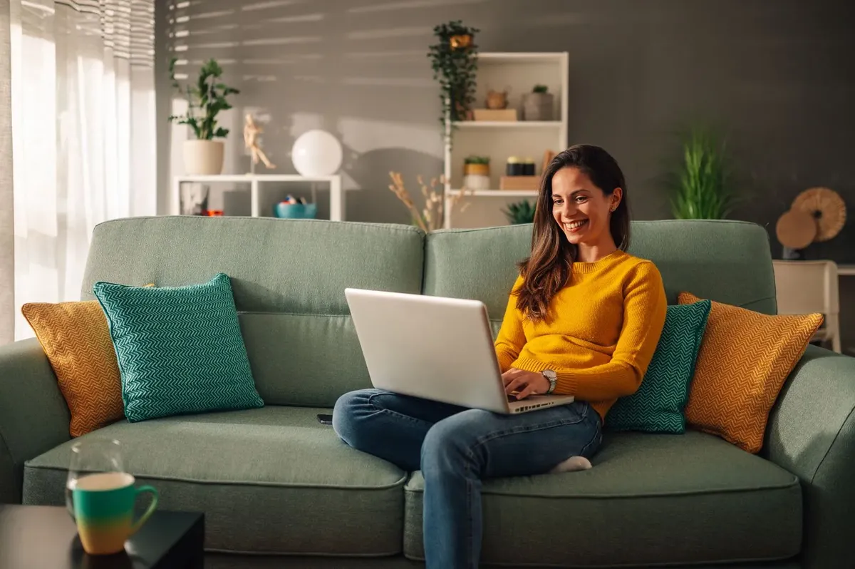 Learner studying on couch
