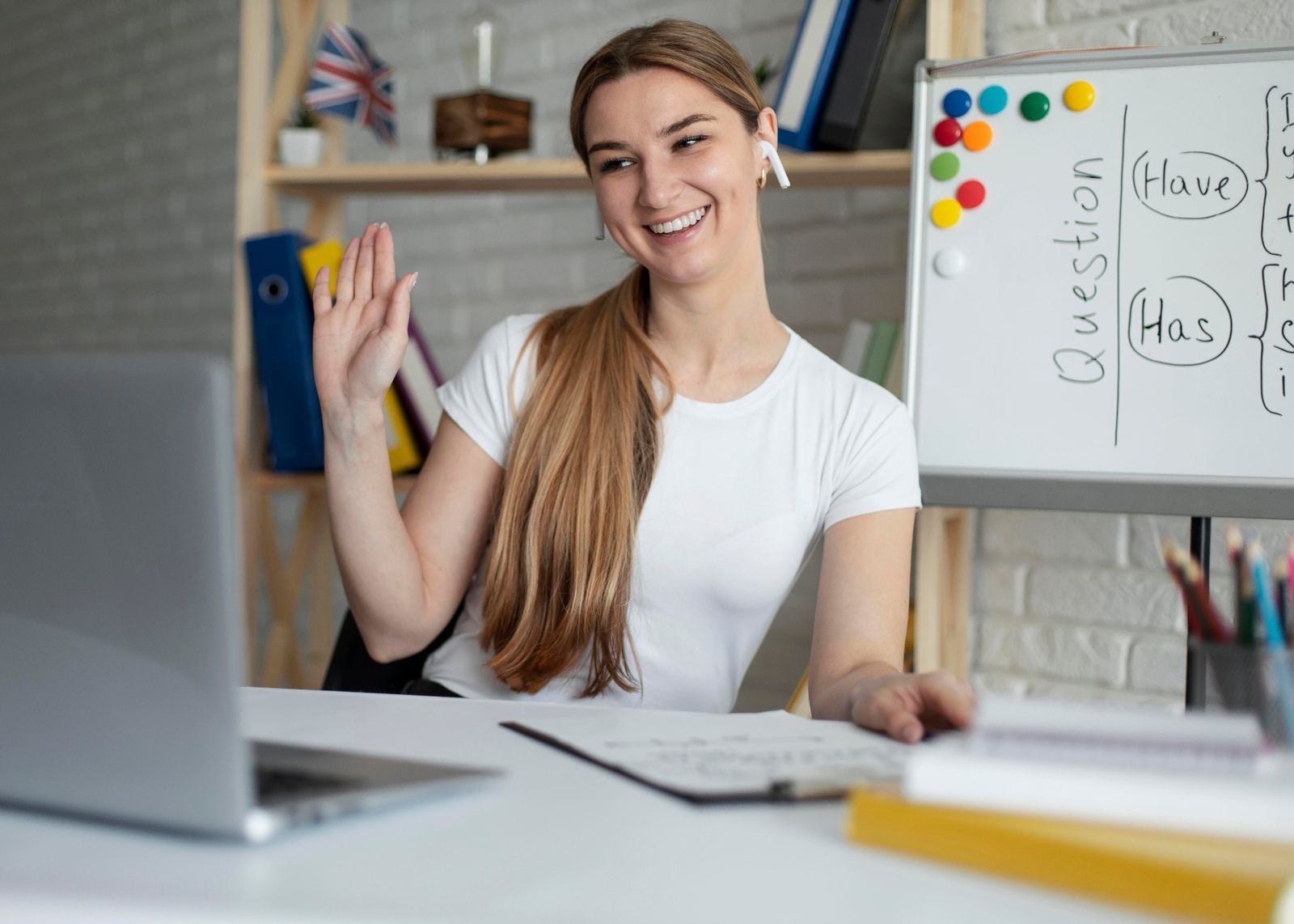 Teacher waving